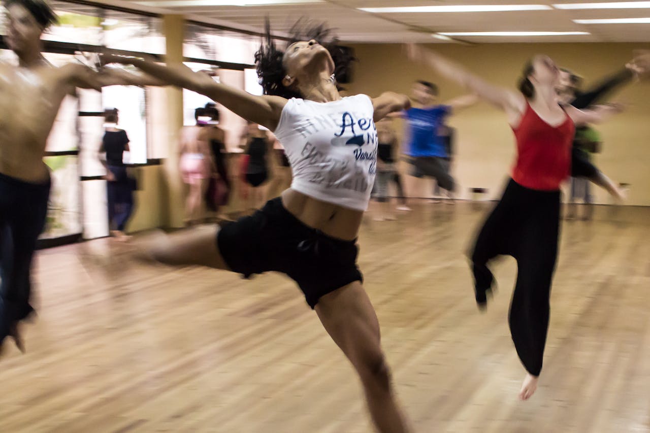 core-values Dynamic group dance class showcasing diverse techniques and spirited expressions.